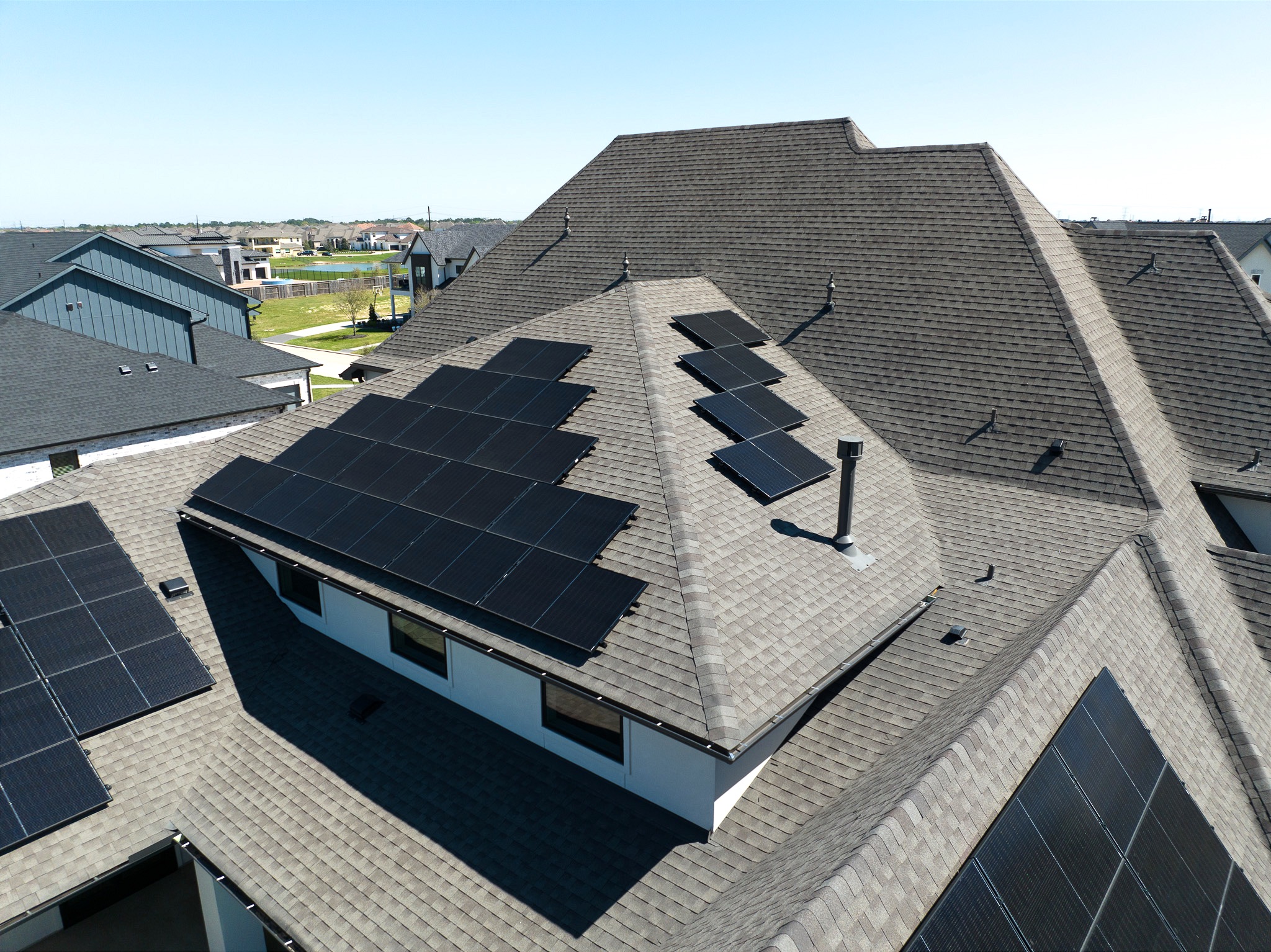 Enertrex all-black solar panels installed on modern home